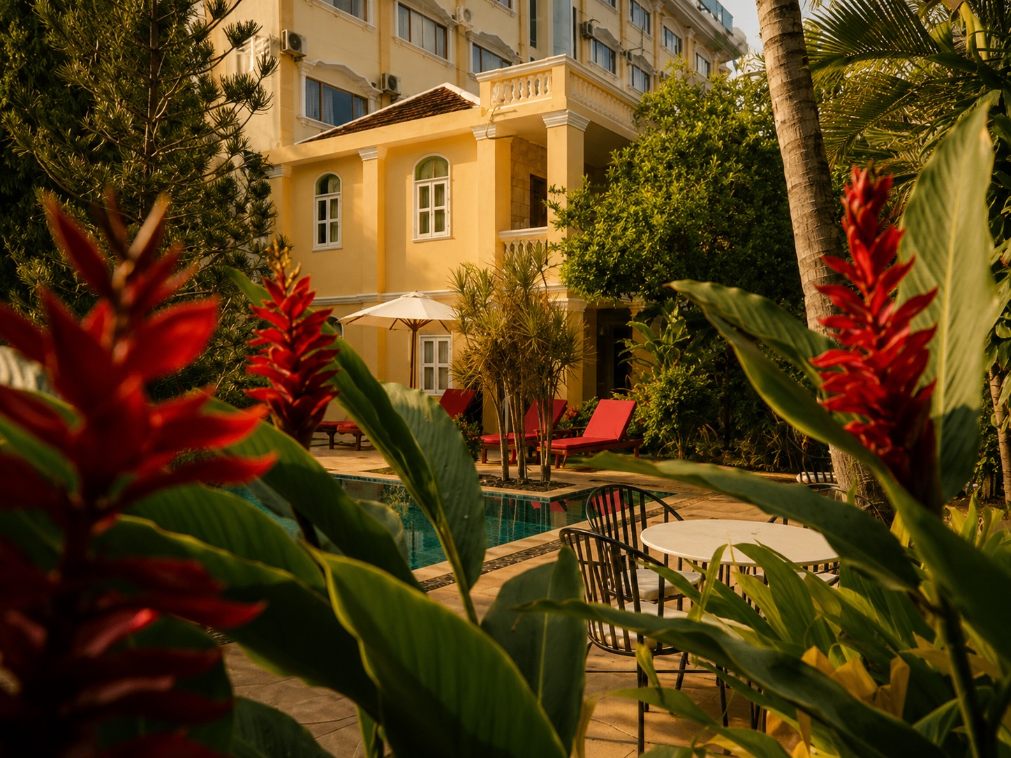 La Villa — garden pool at golden hour